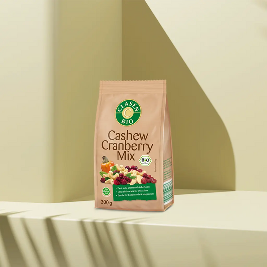 Verpackung Bio-Cashew-Cranberry-Mix 200 g von CLASEN BIO. Fruchtig-nussige Mischung aus milden Cashewkernen und süß-säuerlichen Cranberries im bedruckten Beutel – ideal als Snack oder Topping.