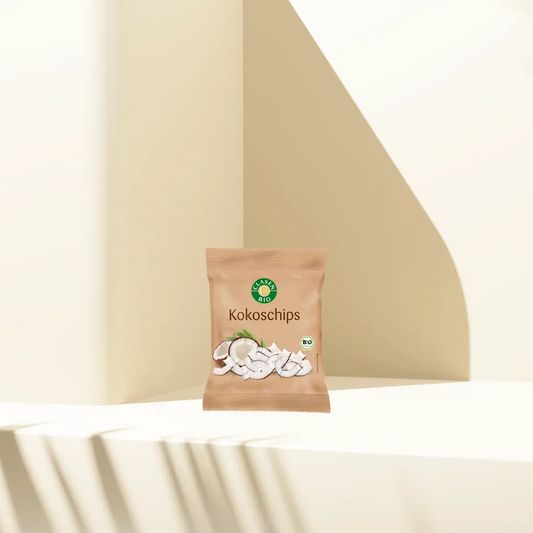 Verpackung Bio-Kokoschips 20 g von CLASEN BIO. Knusprige, leicht geröstete Kokoschips in kleiner Beutelgröße – perfekt als Snack für zwischendurch oder als Topping für Müsli & Smoothie-Bowl.