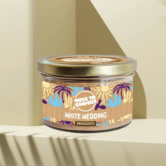 Verpackung Bio-Mandelmus White Wedding 160 g von MUUS TO CHOOZE – helles, feines Mandelmus im Glas mit floralem Etikett und goldenem Deckel